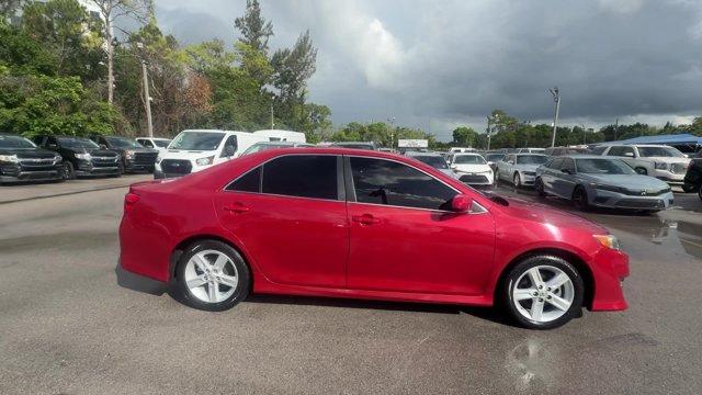 2013 Red Toyota Camry (4T1BF1FK4DU) with an 4 2.5L engine, Automatic transmission, located at 27610 S Dixie Hwy, Homestead, FL, 33032, (305) 749-2348, 25.510241, -80.438301 - KBB.com 10 Best New Sedans Under $25,000. Only 119,306 Miles! Boasts 35 Highway MPG and 25 City MPG! This Toyota Camry delivers a Gas I4 2.5L/152 engine powering this Automatic transmission. Whiplash-lessening front seats, Vehicle stability control, Variable assist pwr rack and pinion steering.* T- Photo#5