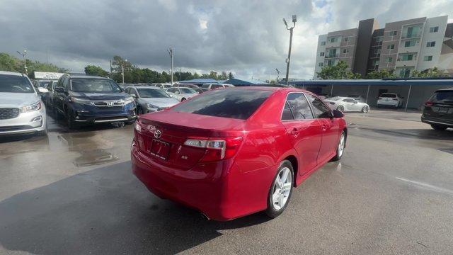 2013 Red Toyota Camry (4T1BF1FK4DU) with an 4 2.5L engine, Automatic transmission, located at 27610 S Dixie Hwy, Homestead, FL, 33032, (305) 749-2348, 25.510241, -80.438301 - KBB.com 10 Best New Sedans Under $25,000. Only 119,306 Miles! Boasts 35 Highway MPG and 25 City MPG! This Toyota Camry delivers a Gas I4 2.5L/152 engine powering this Automatic transmission. Whiplash-lessening front seats, Vehicle stability control, Variable assist pwr rack and pinion steering.* T- Photo#4