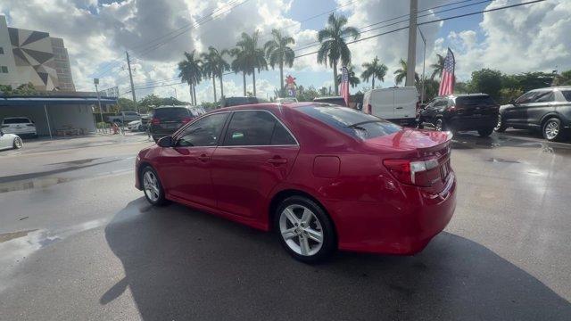 2013 Red Toyota Camry (4T1BF1FK4DU) with an 4 2.5L engine, Automatic transmission, located at 27610 S Dixie Hwy, Homestead, FL, 33032, (305) 749-2348, 25.510241, -80.438301 - KBB.com 10 Best New Sedans Under $25,000. Only 119,306 Miles! Boasts 35 Highway MPG and 25 City MPG! This Toyota Camry delivers a Gas I4 2.5L/152 engine powering this Automatic transmission. Whiplash-lessening front seats, Vehicle stability control, Variable assist pwr rack and pinion steering.* T- Photo#2