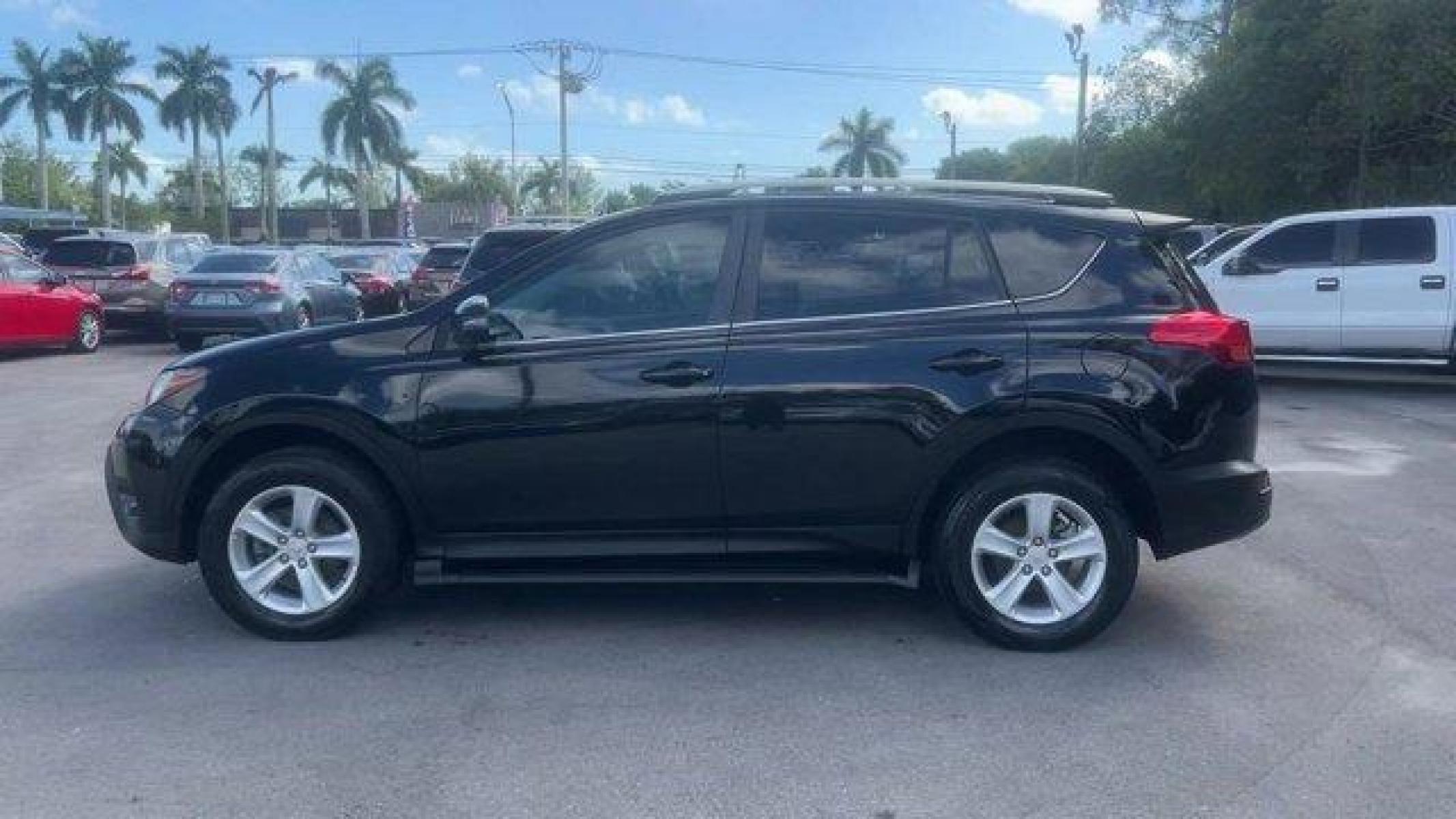 2014 Black Toyota RAV4 XLE (2T3WFREV7EW) with an 4 2.5 L engine, Automatic transmission, located at 27610 S Dixie Hwy, Homestead, FL, 33032, (305) 749-2348, 25.510241, -80.438301 - KBB.com 10 Best SUVs Under $25,000. Only 116,570 Miles! Boasts 31 Highway MPG and 24 City MPG! This Toyota RAV4 delivers a Regular Unleaded I-4 2.5 L/152 engine powering this Automatic transmission. Wheels: 17 x 7.0J Alloy -inc: caps, Variable Intermittent Wipers, Urethane Gear Shifter Material.* Th - Photo #1