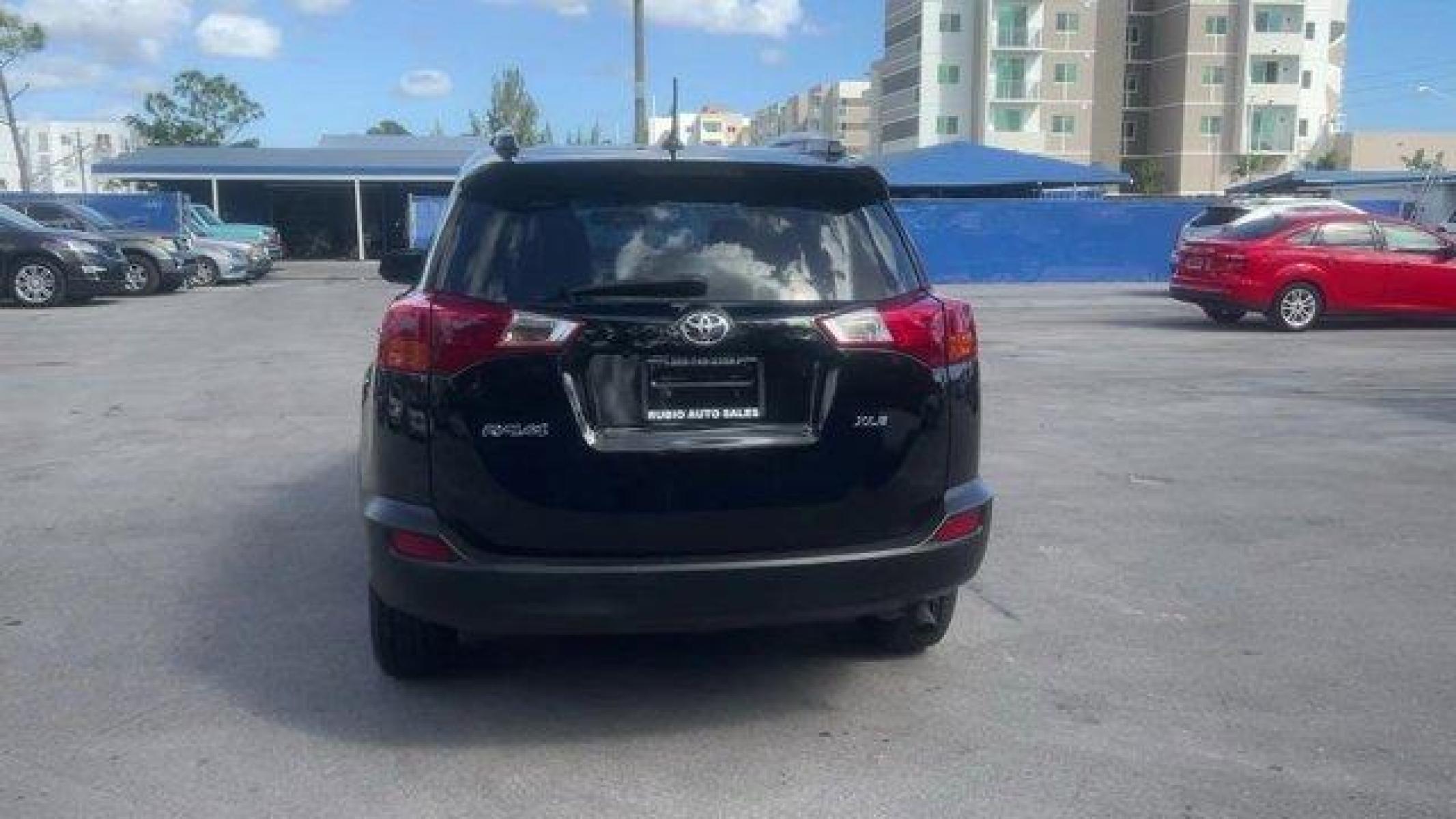 2014 Black Toyota RAV4 XLE (2T3WFREV7EW) with an 4 2.5 L engine, Automatic transmission, located at 27610 S Dixie Hwy, Homestead, FL, 33032, (305) 749-2348, 25.510241, -80.438301 - KBB.com 10 Best SUVs Under $25,000. Only 116,570 Miles! Boasts 31 Highway MPG and 24 City MPG! This Toyota RAV4 delivers a Regular Unleaded I-4 2.5 L/152 engine powering this Automatic transmission. Wheels: 17 x 7.0J Alloy -inc: caps, Variable Intermittent Wipers, Urethane Gear Shifter Material.* Th - Photo #4