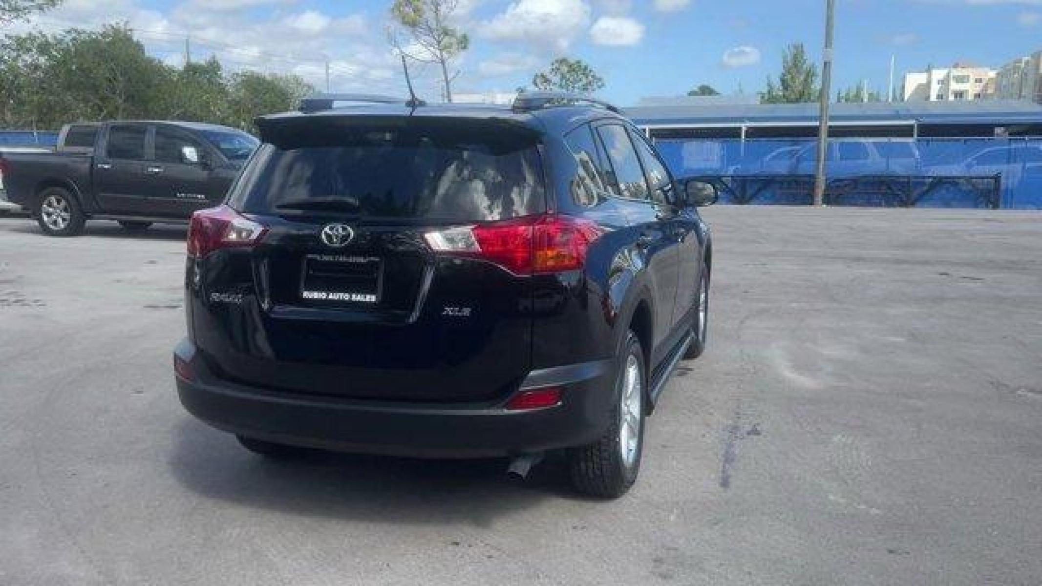 2014 Black Toyota RAV4 XLE (2T3WFREV7EW) with an 4 2.5 L engine, Automatic transmission, located at 27610 S Dixie Hwy, Homestead, FL, 33032, (305) 749-2348, 25.510241, -80.438301 - KBB.com 10 Best SUVs Under $25,000. Only 116,570 Miles! Boasts 31 Highway MPG and 24 City MPG! This Toyota RAV4 delivers a Regular Unleaded I-4 2.5 L/152 engine powering this Automatic transmission. Wheels: 17 x 7.0J Alloy -inc: caps, Variable Intermittent Wipers, Urethane Gear Shifter Material.* Th - Photo #6