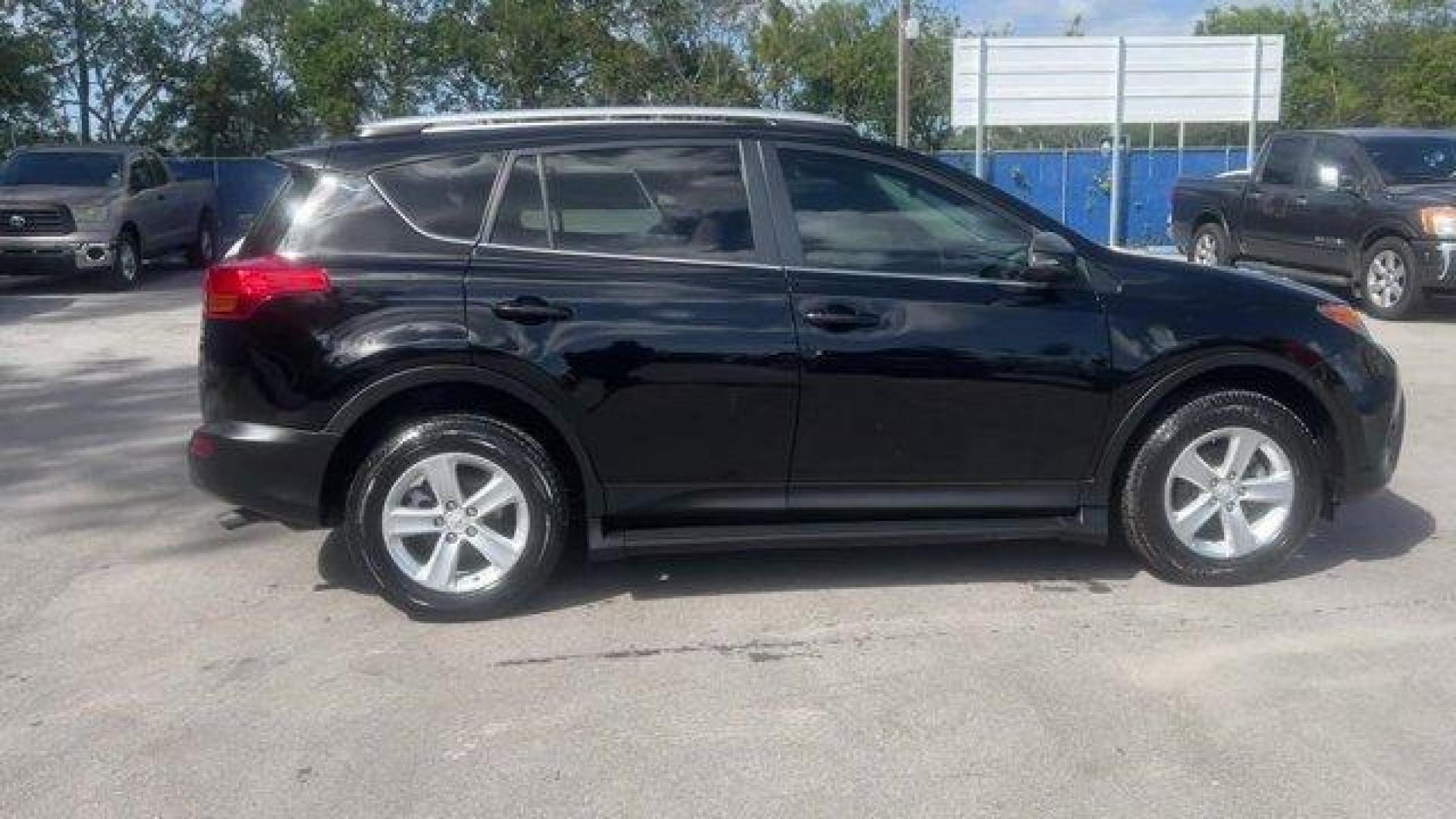 2014 Black Toyota RAV4 XLE (2T3WFREV7EW) with an 4 2.5 L engine, Automatic transmission, located at 27610 S Dixie Hwy, Homestead, FL, 33032, (305) 749-2348, 25.510241, -80.438301 - KBB.com 10 Best SUVs Under $25,000. Only 116,570 Miles! Boasts 31 Highway MPG and 24 City MPG! This Toyota RAV4 delivers a Regular Unleaded I-4 2.5 L/152 engine powering this Automatic transmission. Wheels: 17 x 7.0J Alloy -inc: caps, Variable Intermittent Wipers, Urethane Gear Shifter Material.* Th - Photo #8
