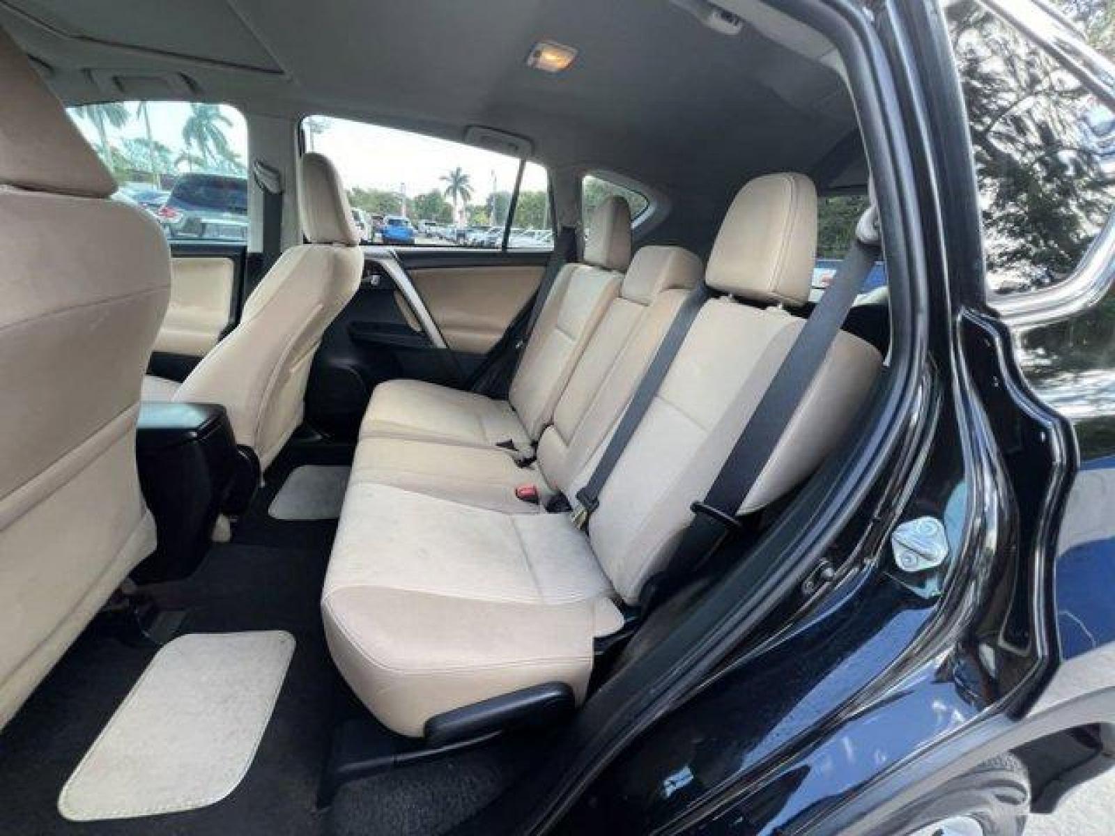 2014 Black Toyota RAV4 XLE (2T3WFREV7EW) with an 4 2.5 L engine, Automatic transmission, located at 27610 S Dixie Hwy, Homestead, FL, 33032, (305) 749-2348, 25.510241, -80.438301 - KBB.com 10 Best SUVs Under $25,000. Only 116,570 Miles! Boasts 31 Highway MPG and 24 City MPG! This Toyota RAV4 delivers a Regular Unleaded I-4 2.5 L/152 engine powering this Automatic transmission. Wheels: 17 x 7.0J Alloy -inc: caps, Variable Intermittent Wipers, Urethane Gear Shifter Material.* Th - Photo #19
