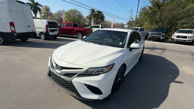 2018 White Toyota Camry L (4T1B11HK2JU) with an 4 2.5 L engine, Automatic transmission, located at 27610 S Dixie Hwy, Homestead, FL, 33032, (305) 749-2348, 25.510241, -80.438301 - KBB.com 10 Most Awarded Cars. This Toyota Camry boasts a Regular Unleaded I-4 2.5 L/152 engine powering this Automatic transmission. Window Grid Antenna, Variable Intermittent Wipers, Valet Function.*This Toyota Camry Comes Equipped with These Options *Trunk Rear Cargo Access, Trip Computer, Toyota - Photo#0