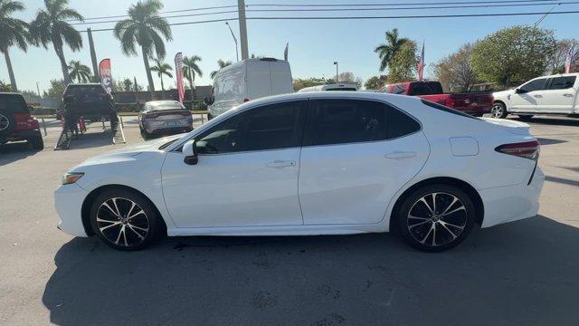 2018 White Toyota Camry L (4T1B11HK2JU) with an 4 2.5 L engine, Automatic transmission, located at 27610 S Dixie Hwy, Homestead, FL, 33032, (305) 749-2348, 25.510241, -80.438301 - KBB.com 10 Most Awarded Cars. This Toyota Camry boasts a Regular Unleaded I-4 2.5 L/152 engine powering this Automatic transmission. Window Grid Antenna, Variable Intermittent Wipers, Valet Function.*This Toyota Camry Comes Equipped with These Options *Trunk Rear Cargo Access, Trip Computer, Toyota - Photo#1