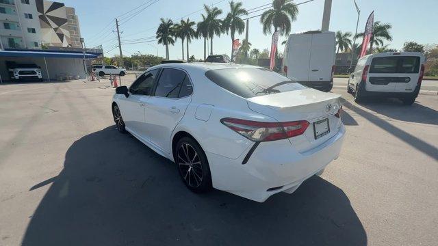 2018 White Toyota Camry L (4T1B11HK2JU) with an 4 2.5 L engine, Automatic transmission, located at 27610 S Dixie Hwy, Homestead, FL, 33032, (305) 749-2348, 25.510241, -80.438301 - KBB.com 10 Most Awarded Cars. This Toyota Camry boasts a Regular Unleaded I-4 2.5 L/152 engine powering this Automatic transmission. Window Grid Antenna, Variable Intermittent Wipers, Valet Function.*This Toyota Camry Comes Equipped with These Options *Trunk Rear Cargo Access, Trip Computer, Toyota - Photo#2