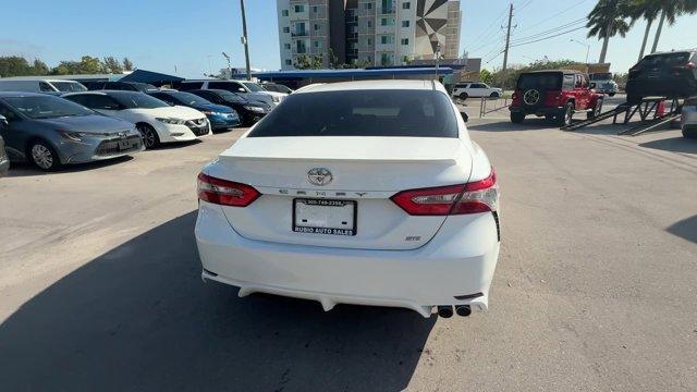 2018 White Toyota Camry L (4T1B11HK2JU) with an 4 2.5 L engine, Automatic transmission, located at 27610 S Dixie Hwy, Homestead, FL, 33032, (305) 749-2348, 25.510241, -80.438301 - KBB.com 10 Most Awarded Cars. This Toyota Camry boasts a Regular Unleaded I-4 2.5 L/152 engine powering this Automatic transmission. Window Grid Antenna, Variable Intermittent Wipers, Valet Function.*This Toyota Camry Comes Equipped with These Options *Trunk Rear Cargo Access, Trip Computer, Toyota - Photo#3