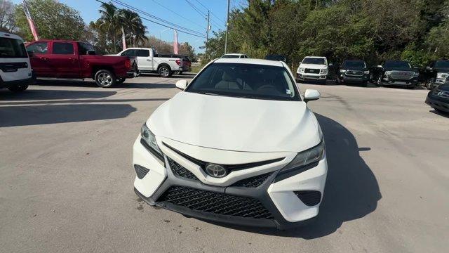 2018 White Toyota Camry L (4T1B11HK2JU) with an 4 2.5 L engine, Automatic transmission, located at 27610 S Dixie Hwy, Homestead, FL, 33032, (305) 749-2348, 25.510241, -80.438301 - KBB.com 10 Most Awarded Cars. This Toyota Camry boasts a Regular Unleaded I-4 2.5 L/152 engine powering this Automatic transmission. Window Grid Antenna, Variable Intermittent Wipers, Valet Function.*This Toyota Camry Comes Equipped with These Options *Trunk Rear Cargo Access, Trip Computer, Toyota - Photo#7