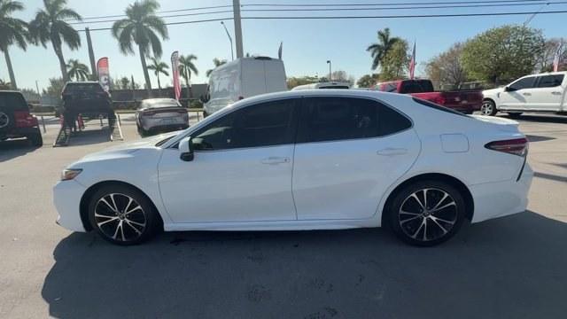 2018 White Toyota Camry L (4T1B11HK2JU) with an 4 2.5 L engine, Automatic transmission, located at 27610 S Dixie Hwy, Homestead, FL, 33032, (305) 749-2348, 25.510241, -80.438301 - KBB.com 10 Most Awarded Cars. This Toyota Camry boasts a Regular Unleaded I-4 2.5 L/152 engine powering this Automatic transmission. Window Grid Antenna, Variable Intermittent Wipers, Valet Function.*This Toyota Camry Comes Equipped with These Options *Trunk Rear Cargo Access, Trip Computer, Toyota - Photo#1