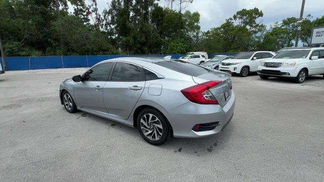 2018 Silver Honda Civic Sedan EX (19XFC2F72JE) with an 4 2.0 L engine, Variable transmission, located at 27610 S Dixie Hwy, Homestead, FL, 33032, (305) 749-2348, 25.510241, -80.438301 - KBB.com 10 Most Awarded Brands. Boasts 40 Highway MPG and 31 City MPG! This Honda Civic Sedan delivers a Regular Unleaded I-4 2.0 L/122 engine powering this Variable transmission. Wheels: 16 Alloy, Wheels w/Silver Accents, VSA Electronic Stability Control (ESC).* This Honda Civic Sedan Features the - Photo#2