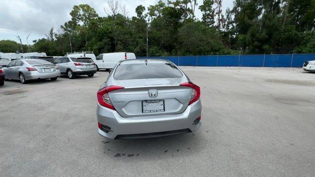 2018 Silver Honda Civic Sedan EX (19XFC2F72JE) with an 4 2.0 L engine, Variable transmission, located at 27610 S Dixie Hwy, Homestead, FL, 33032, (305) 749-2348, 25.510241, -80.438301 - KBB.com 10 Most Awarded Brands. Boasts 40 Highway MPG and 31 City MPG! This Honda Civic Sedan delivers a Regular Unleaded I-4 2.0 L/122 engine powering this Variable transmission. Wheels: 16 Alloy, Wheels w/Silver Accents, VSA Electronic Stability Control (ESC).* This Honda Civic Sedan Features the - Photo#3