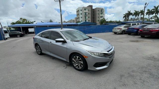 2018 Silver Honda Civic Sedan EX (19XFC2F72JE) with an 4 2.0 L engine, Variable transmission, located at 27610 S Dixie Hwy, Homestead, FL, 33032, (305) 749-2348, 25.510241, -80.438301 - KBB.com 10 Most Awarded Brands. Boasts 40 Highway MPG and 31 City MPG! This Honda Civic Sedan delivers a Regular Unleaded I-4 2.0 L/122 engine powering this Variable transmission. Wheels: 16 Alloy, Wheels w/Silver Accents, VSA Electronic Stability Control (ESC).* This Honda Civic Sedan Features the - Photo#6