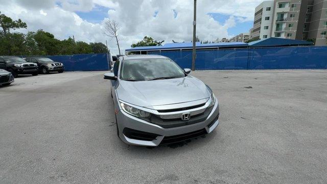 2018 Silver Honda Civic Sedan EX (19XFC2F72JE) with an 4 2.0 L engine, Variable transmission, located at 27610 S Dixie Hwy, Homestead, FL, 33032, (305) 749-2348, 25.510241, -80.438301 - KBB.com 10 Most Awarded Brands. Boasts 40 Highway MPG and 31 City MPG! This Honda Civic Sedan delivers a Regular Unleaded I-4 2.0 L/122 engine powering this Variable transmission. Wheels: 16 Alloy, Wheels w/Silver Accents, VSA Electronic Stability Control (ESC).* This Honda Civic Sedan Features the - Photo#7