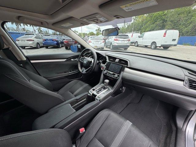 2018 Silver Honda Civic Sedan EX (19XFC2F72JE) with an 4 2.0 L engine, Variable transmission, located at 27610 S Dixie Hwy, Homestead, FL, 33032, (305) 749-2348, 25.510241, -80.438301 - KBB.com 10 Most Awarded Brands. Boasts 40 Highway MPG and 31 City MPG! This Honda Civic Sedan delivers a Regular Unleaded I-4 2.0 L/122 engine powering this Variable transmission. Wheels: 16 Alloy, Wheels w/Silver Accents, VSA Electronic Stability Control (ESC).* This Honda Civic Sedan Features the - Photo#13