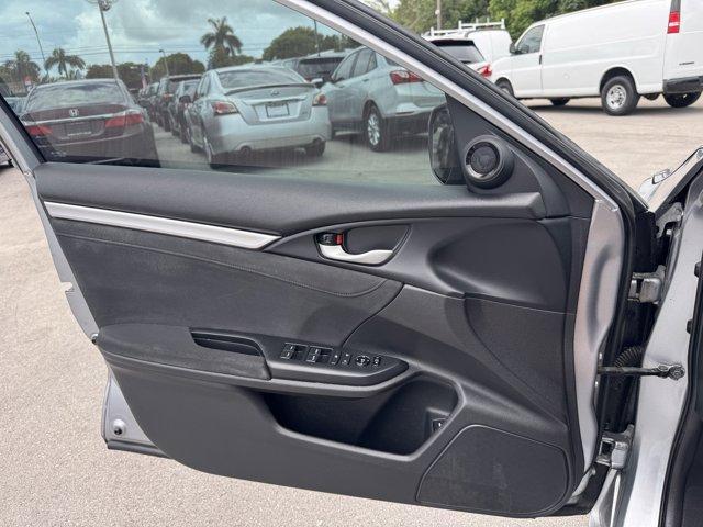 2018 Silver Honda Civic Sedan EX (19XFC2F72JE) with an 4 2.0 L engine, Variable transmission, located at 27610 S Dixie Hwy, Homestead, FL, 33032, (305) 749-2348, 25.510241, -80.438301 - KBB.com 10 Most Awarded Brands. Boasts 40 Highway MPG and 31 City MPG! This Honda Civic Sedan delivers a Regular Unleaded I-4 2.0 L/122 engine powering this Variable transmission. Wheels: 16 Alloy, Wheels w/Silver Accents, VSA Electronic Stability Control (ESC).* This Honda Civic Sedan Features the - Photo#14
