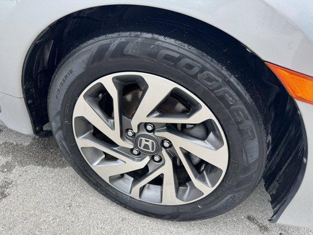 2018 Silver Honda Civic Sedan EX (19XFC2F72JE) with an 4 2.0 L engine, Variable transmission, located at 27610 S Dixie Hwy, Homestead, FL, 33032, (305) 749-2348, 25.510241, -80.438301 - KBB.com 10 Most Awarded Brands. Boasts 40 Highway MPG and 31 City MPG! This Honda Civic Sedan delivers a Regular Unleaded I-4 2.0 L/122 engine powering this Variable transmission. Wheels: 16 Alloy, Wheels w/Silver Accents, VSA Electronic Stability Control (ESC).* This Honda Civic Sedan Features the - Photo#18