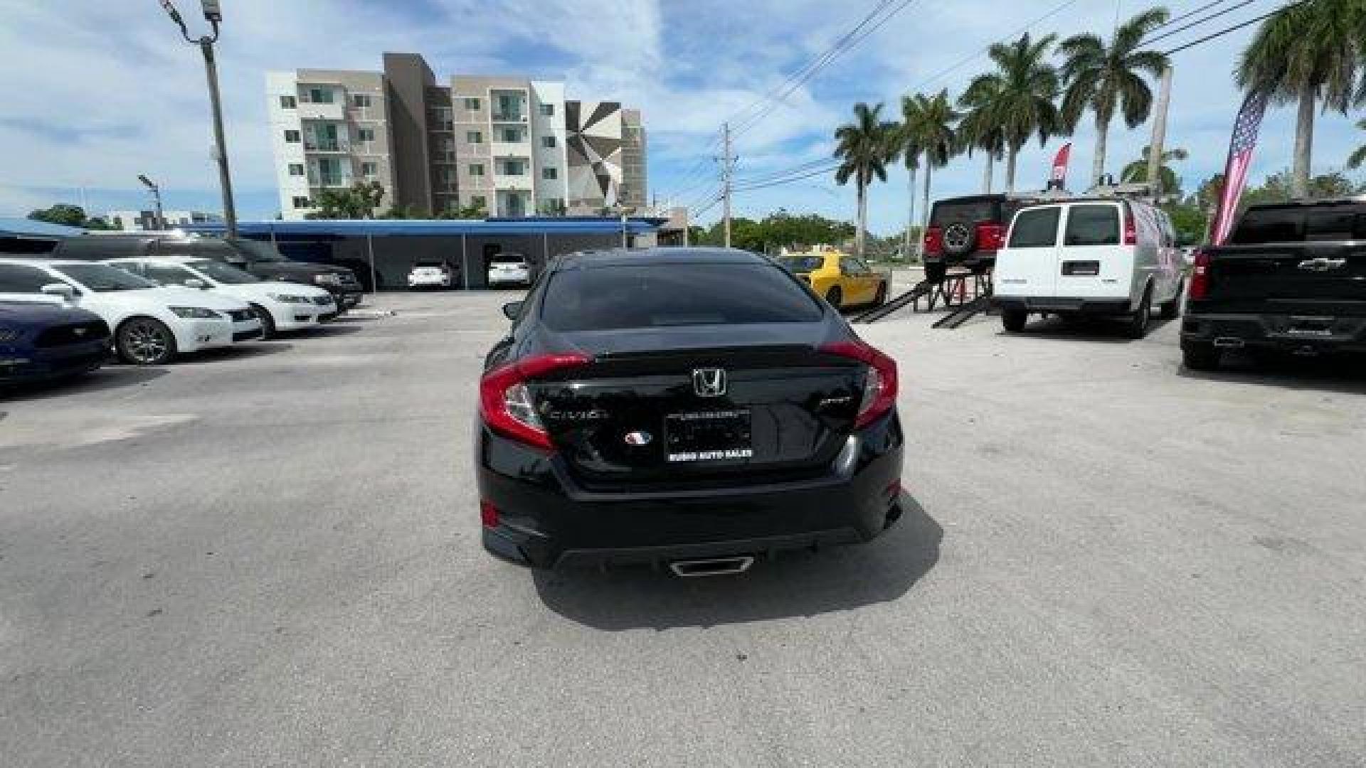 2021 Black Honda Civic Sedan Sport (2HGFC2F8XMH) with an 4 2.0 L engine, Variable transmission, located at 27610 S Dixie Hwy, Homestead, FL, 33032, (305) 749-2348, 25.510241, -80.438301 - Only 40,080 Miles! Scores 37 Highway MPG and 29 City MPG! This Honda Civic Sedan delivers a Regular Unleaded I-4 2.0 L/122 engine powering this Variable transmission. Window Grid Antenna, Wheels: 18 Alloy w/Gloss Black Inserts, Vehicle Stability Assist (VSA) Electronic Stability Control (ESC).* This - Photo#3
