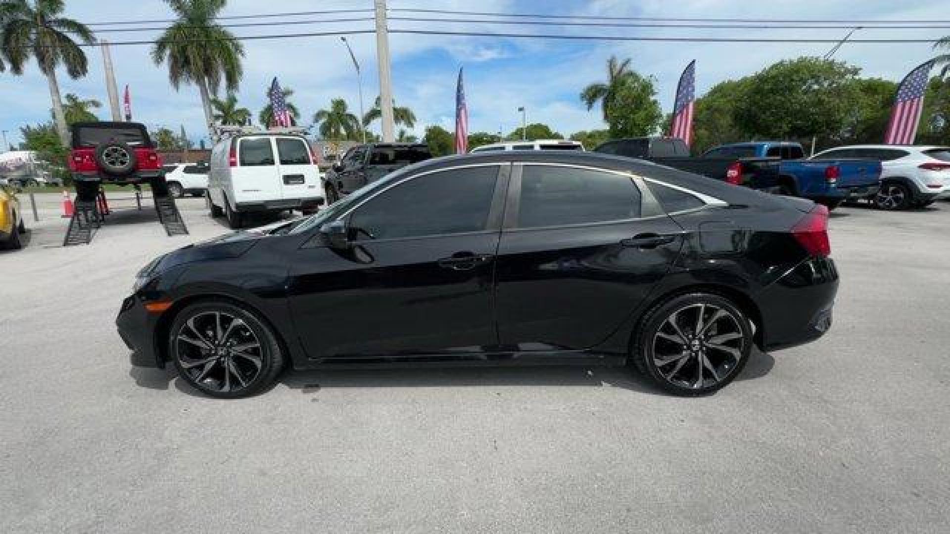 2021 Black Honda Civic Sedan Sport (2HGFC2F8XMH) with an 4 2.0 L engine, Variable transmission, located at 27610 S Dixie Hwy, Homestead, FL, 33032, (305) 749-2348, 25.510241, -80.438301 - Only 40,080 Miles! Scores 37 Highway MPG and 29 City MPG! This Honda Civic Sedan delivers a Regular Unleaded I-4 2.0 L/122 engine powering this Variable transmission. Window Grid Antenna, Wheels: 18 Alloy w/Gloss Black Inserts, Vehicle Stability Assist (VSA) Electronic Stability Control (ESC).* This - Photo#5
