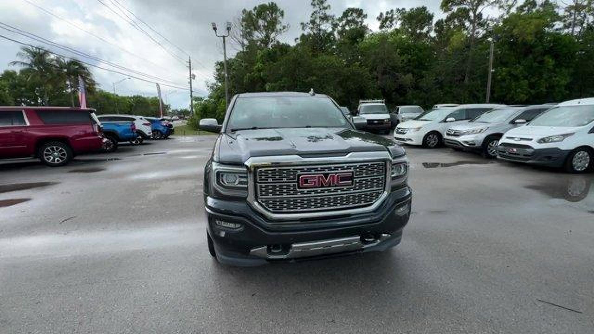 2018 Dark Slate Metallic /Jet Black GMC Sierra 1500 Denali (3GTU2PEJ0JG) with an 8 6.2L engine, Automatic transmission, located at 27610 S Dixie Hwy, Homestead, FL, 33032, (305) 749-2348, 25.510241, -80.438301 - Delivers 20 Highway MPG and 15 City MPG! This GMC Sierra 1500 boasts a Gas V8 6.2L/376 engine powering this Automatic transmission. WHEELS, 22 (55.9 CM) ALUMINUM with premium paint and chrome inserts, TRI-MODE POWER STEPS, REARWARD ARTICULATING (providing bed access). Foot activated running side boa - Photo#7