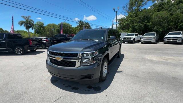 2020 Shadow Gray Metallic /Jet Black Chevrolet Suburban LS (1GNSCGKC9LR) with an 8 5.3L engine, Automatic transmission, located at 27610 S Dixie Hwy, Homestead, FL, 33032, (305) 749-2348, 25.510241, -80.438301 - Only 53,513 Miles! Delivers 22 Highway MPG and 15 City MPG! This Chevrolet Suburban boasts a Gas/Ethanol V8 5.3L/ engine powering this Automatic transmission. WHEELS, 18 X 8.5 (45.7 CM X 21.6 CM) ALUMINUM WITH HIGH-POLISHED FINISH (STD), TRANSMISSION, 6-SPEED AUTOMATIC, ELECTRONICALLY CONTROLLED wit - Photo#0