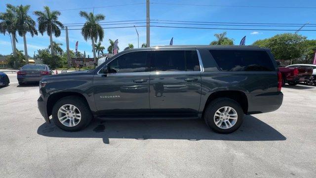 2020 Shadow Gray Metallic /Jet Black Chevrolet Suburban LS (1GNSCGKC9LR) with an 8 5.3L engine, Automatic transmission, located at 27610 S Dixie Hwy, Homestead, FL, 33032, (305) 749-2348, 25.510241, -80.438301 - Only 53,513 Miles! Delivers 22 Highway MPG and 15 City MPG! This Chevrolet Suburban boasts a Gas/Ethanol V8 5.3L/ engine powering this Automatic transmission. WHEELS, 18 X 8.5 (45.7 CM X 21.6 CM) ALUMINUM WITH HIGH-POLISHED FINISH (STD), TRANSMISSION, 6-SPEED AUTOMATIC, ELECTRONICALLY CONTROLLED wit - Photo#1