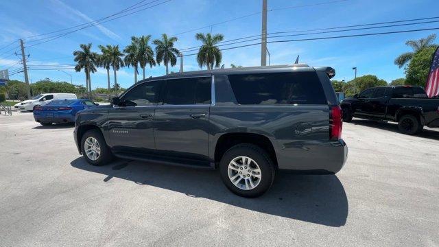 2020 Shadow Gray Metallic /Jet Black Chevrolet Suburban LS (1GNSCGKC9LR) with an 8 5.3L engine, Automatic transmission, located at 27610 S Dixie Hwy, Homestead, FL, 33032, (305) 749-2348, 25.510241, -80.438301 - Only 53,513 Miles! Delivers 22 Highway MPG and 15 City MPG! This Chevrolet Suburban boasts a Gas/Ethanol V8 5.3L/ engine powering this Automatic transmission. WHEELS, 18 X 8.5 (45.7 CM X 21.6 CM) ALUMINUM WITH HIGH-POLISHED FINISH (STD), TRANSMISSION, 6-SPEED AUTOMATIC, ELECTRONICALLY CONTROLLED wit - Photo#2
