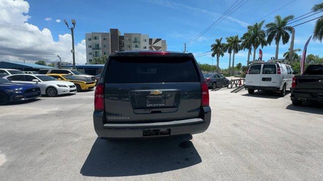 2020 Shadow Gray Metallic /Jet Black Chevrolet Suburban LS (1GNSCGKC9LR) with an 8 5.3L engine, Automatic transmission, located at 27610 S Dixie Hwy, Homestead, FL, 33032, (305) 749-2348, 25.510241, -80.438301 - Only 53,513 Miles! Delivers 22 Highway MPG and 15 City MPG! This Chevrolet Suburban boasts a Gas/Ethanol V8 5.3L/ engine powering this Automatic transmission. WHEELS, 18 X 8.5 (45.7 CM X 21.6 CM) ALUMINUM WITH HIGH-POLISHED FINISH (STD), TRANSMISSION, 6-SPEED AUTOMATIC, ELECTRONICALLY CONTROLLED wit - Photo#3