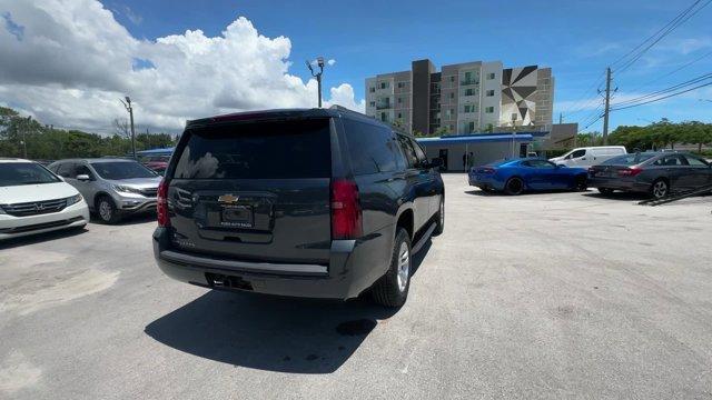 2020 Shadow Gray Metallic /Jet Black Chevrolet Suburban LS (1GNSCGKC9LR) with an 8 5.3L engine, Automatic transmission, located at 27610 S Dixie Hwy, Homestead, FL, 33032, (305) 749-2348, 25.510241, -80.438301 - Only 53,513 Miles! Delivers 22 Highway MPG and 15 City MPG! This Chevrolet Suburban boasts a Gas/Ethanol V8 5.3L/ engine powering this Automatic transmission. WHEELS, 18 X 8.5 (45.7 CM X 21.6 CM) ALUMINUM WITH HIGH-POLISHED FINISH (STD), TRANSMISSION, 6-SPEED AUTOMATIC, ELECTRONICALLY CONTROLLED wit - Photo#4