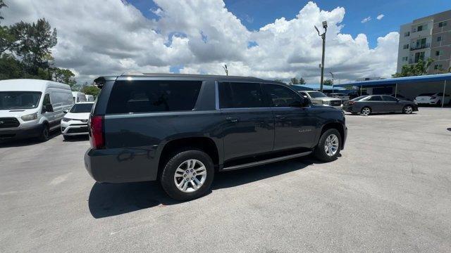 2020 Shadow Gray Metallic /Jet Black Chevrolet Suburban LS (1GNSCGKC9LR) with an 8 5.3L engine, Automatic transmission, located at 27610 S Dixie Hwy, Homestead, FL, 33032, (305) 749-2348, 25.510241, -80.438301 - Only 53,513 Miles! Delivers 22 Highway MPG and 15 City MPG! This Chevrolet Suburban boasts a Gas/Ethanol V8 5.3L/ engine powering this Automatic transmission. WHEELS, 18 X 8.5 (45.7 CM X 21.6 CM) ALUMINUM WITH HIGH-POLISHED FINISH (STD), TRANSMISSION, 6-SPEED AUTOMATIC, ELECTRONICALLY CONTROLLED wit - Photo#5