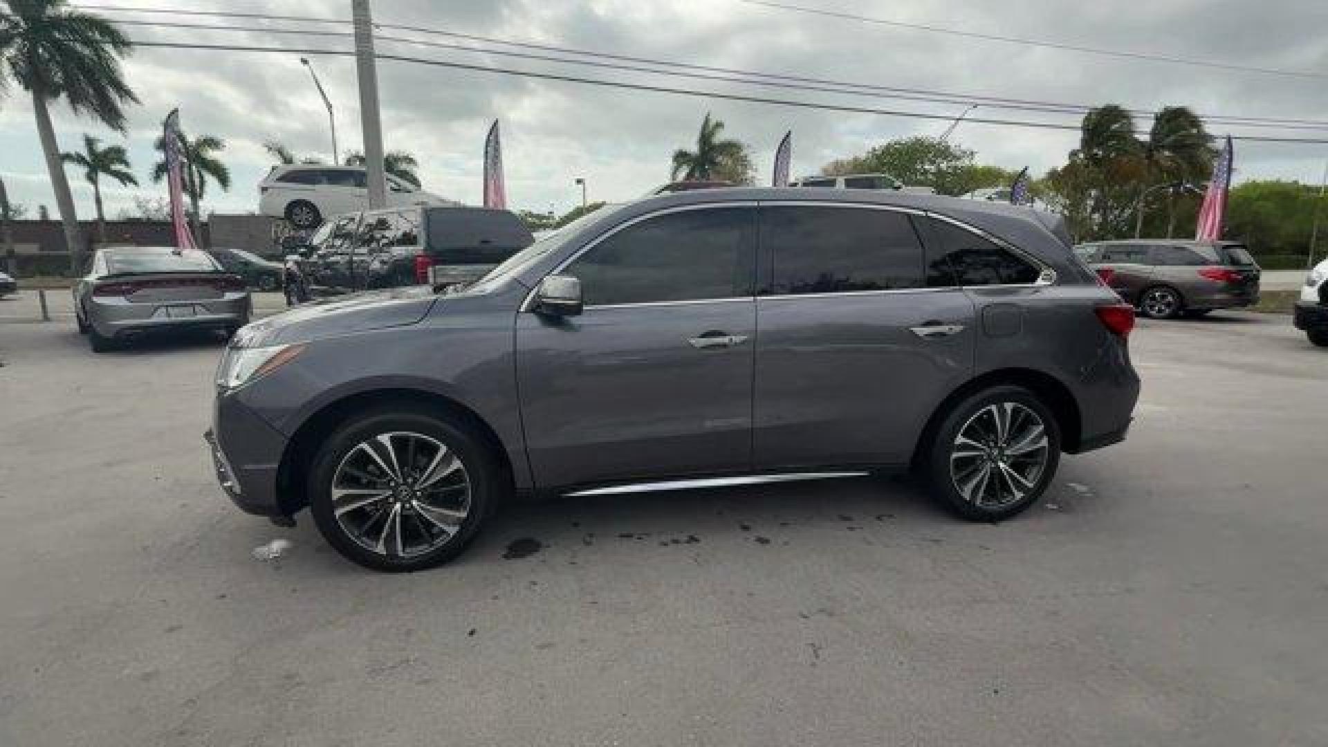 2020 Gray Acura MDX Technology (5J8YD3H52LL) with an 6 3.5 L engine, Automatic transmission, located at 27610 S Dixie Hwy, Homestead, FL, 33032, (305) 749-2348, 25.510241, -80.438301 - Only 23,617 Miles! Delivers 27 Highway MPG and 20 City MPG! This Acura MDX boasts a Premium Unleaded V-6 3.5 L/212 engine powering this Automatic transmission. Window Grid Antenna, Wheels: 20 x 8 Shark Gray Twisted 10-Spoke -inc: Machine-finished, Voice Activated Multi Zone Auto-Climate Control Air - Photo#1