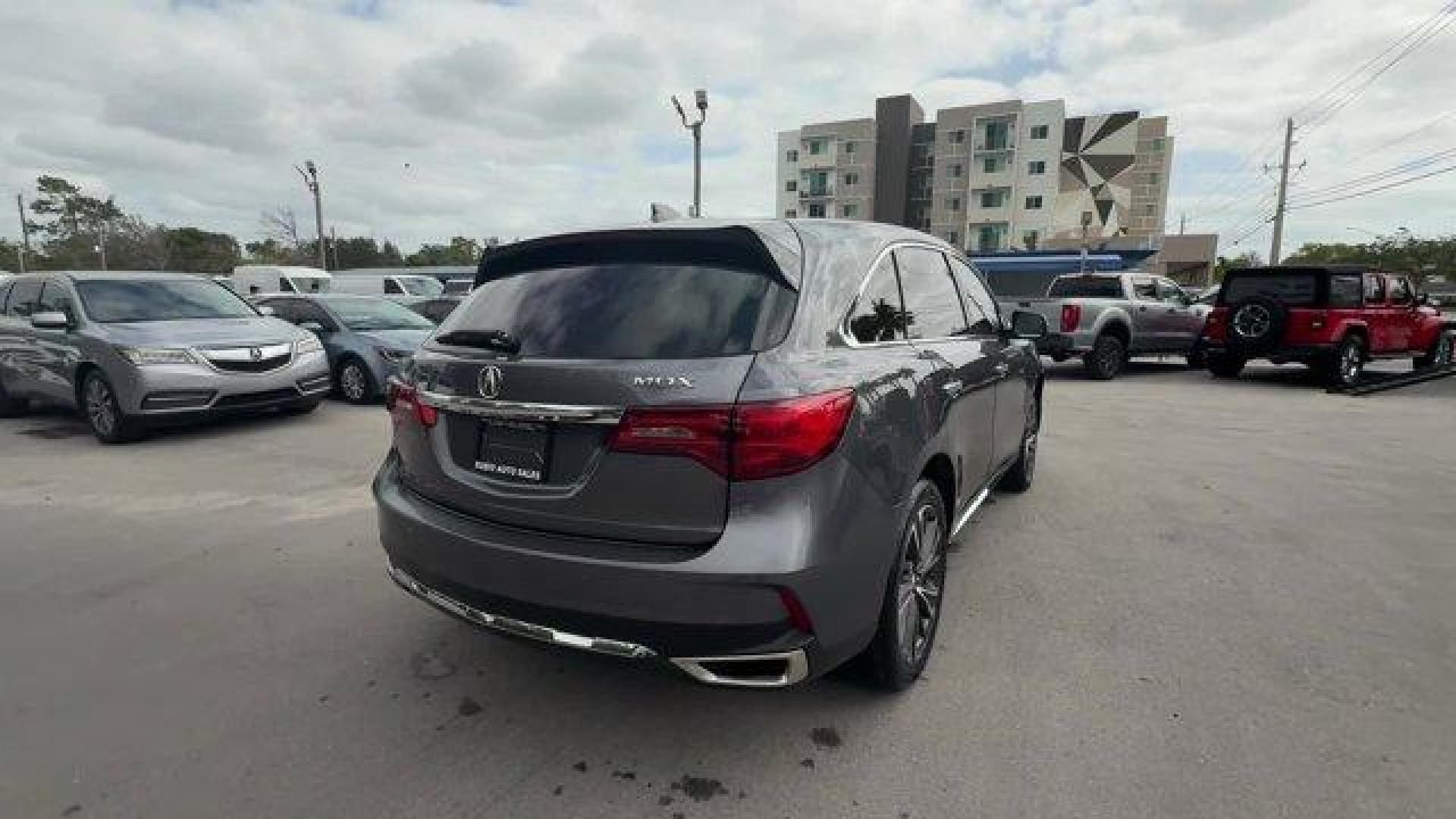 2020 Gray Acura MDX Technology (5J8YD3H52LL) with an 6 3.5 L engine, Automatic transmission, located at 27610 S Dixie Hwy, Homestead, FL, 33032, (305) 749-2348, 25.510241, -80.438301 - Only 23,617 Miles! Delivers 27 Highway MPG and 20 City MPG! This Acura MDX boasts a Premium Unleaded V-6 3.5 L/212 engine powering this Automatic transmission. Window Grid Antenna, Wheels: 20 x 8 Shark Gray Twisted 10-Spoke -inc: Machine-finished, Voice Activated Multi Zone Auto-Climate Control Air - Photo#4