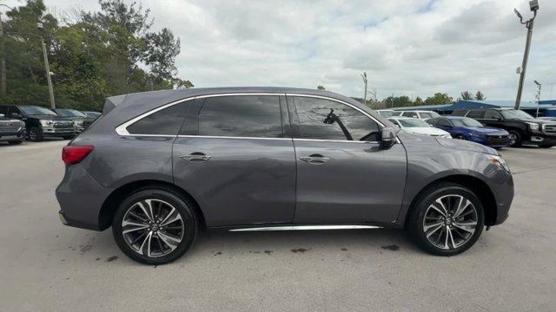 2020 Gray Acura MDX Technology (5J8YD3H52LL) with an 6 3.5 L engine, Automatic transmission, located at 27610 S Dixie Hwy, Homestead, FL, 33032, (305) 749-2348, 25.510241, -80.438301 - Only 23,617 Miles! Delivers 27 Highway MPG and 20 City MPG! This Acura MDX boasts a Premium Unleaded V-6 3.5 L/212 engine powering this Automatic transmission. Window Grid Antenna, Wheels: 20 x 8 Shark Gray Twisted 10-Spoke -inc: Machine-finished, Voice Activated Multi Zone Auto-Climate Control Air - Photo#5