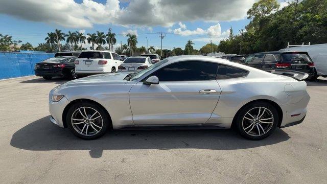 2017 Silver Ford Mustang EcoBoost Premium (1FA6P8TH2H5) with an 4 2.3 L engine, Automatic transmission, located at 27610 S Dixie Hwy, Homestead, FL, 33032, (305) 749-2348, 25.510241, -80.438301 - KBB.com 10 Coolest Cars Under $25,000. Scores 30 Highway MPG and 21 City MPG! This Ford Mustang boasts a Intercooled Turbo Premium Unleaded I-4 2.3 L/140 engine powering this Automatic transmission. ENGINE: 2.3L ECOBOOST (STD), Wireless Phone Connectivity, Wheels: 18 x 8 Magnetic Painted/Machined -i - Photo#1