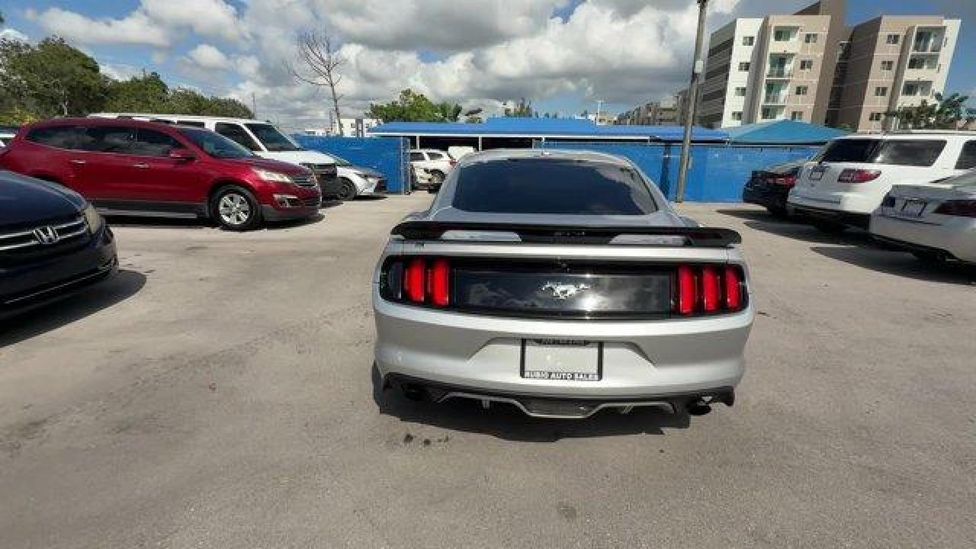 2017 Silver Ford Mustang EcoBoost Premium (1FA6P8TH2H5) with an 4 2.3 L engine, Automatic transmission, located at 27610 S Dixie Hwy, Homestead, FL, 33032, (305) 749-2348, 25.510241, -80.438301 - KBB.com 10 Coolest Cars Under $25,000. Scores 30 Highway MPG and 21 City MPG! This Ford Mustang boasts a Intercooled Turbo Premium Unleaded I-4 2.3 L/140 engine powering this Automatic transmission. ENGINE: 2.3L ECOBOOST (STD), Wireless Phone Connectivity, Wheels: 18 x 8 Magnetic Painted/Machined -i - Photo#3