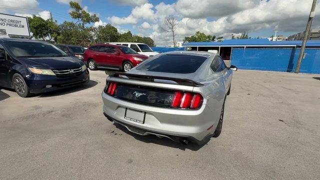 2017 Silver Ford Mustang EcoBoost Premium (1FA6P8TH2H5) with an 4 2.3 L engine, Automatic transmission, located at 27610 S Dixie Hwy, Homestead, FL, 33032, (305) 749-2348, 25.510241, -80.438301 - KBB.com 10 Coolest Cars Under $25,000. Scores 30 Highway MPG and 21 City MPG! This Ford Mustang boasts a Intercooled Turbo Premium Unleaded I-4 2.3 L/140 engine powering this Automatic transmission. ENGINE: 2.3L ECOBOOST (STD), Wireless Phone Connectivity, Wheels: 18 x 8 Magnetic Painted/Machined -i - Photo#4