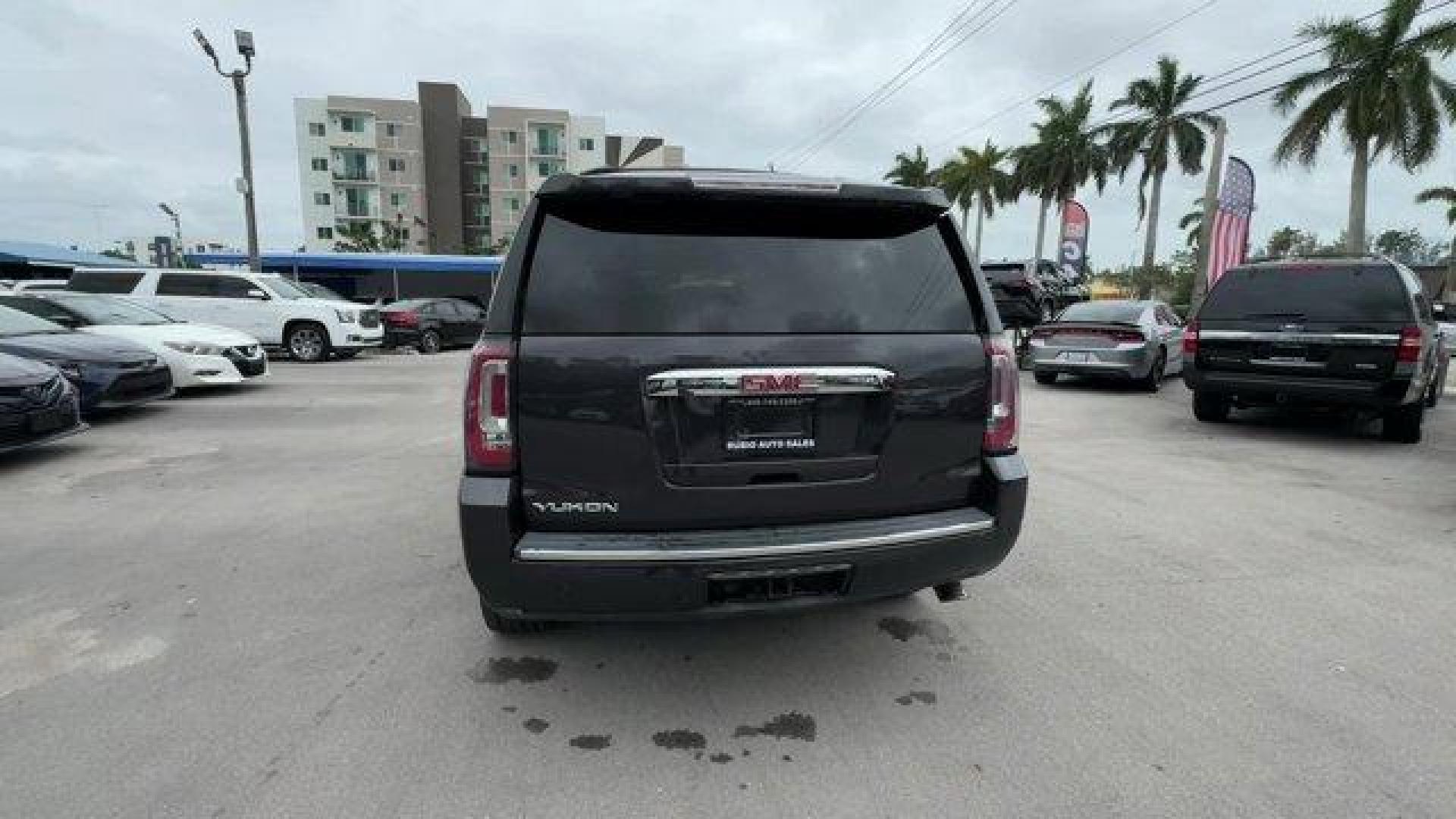 2015 Iridium Metallic /Cocoa/Shale GMC Yukon Denali (1GKS2CKJ0FR) with an 8 6.2L engine, Automatic transmission, located at 27610 S Dixie Hwy, Homestead, FL, 33032, (305) 749-2348, 25.510241, -80.438301 - KBB.com Brand Image Awards. Scores 21 Highway MPG and 15 City MPG! This GMC Yukon delivers a Gas V8 6.2L/378 engine powering this Automatic transmission. WHEELS, 22 X 8.5 (55.9 CM X 21.6 CM) ALUMINUM WITH CHROME INSERT, TRANSMISSION, 8-SPEED AUTOMATIC (STD), TIRES, P285/45R22, ALL SEASON, BLACKWALL - Photo#3
