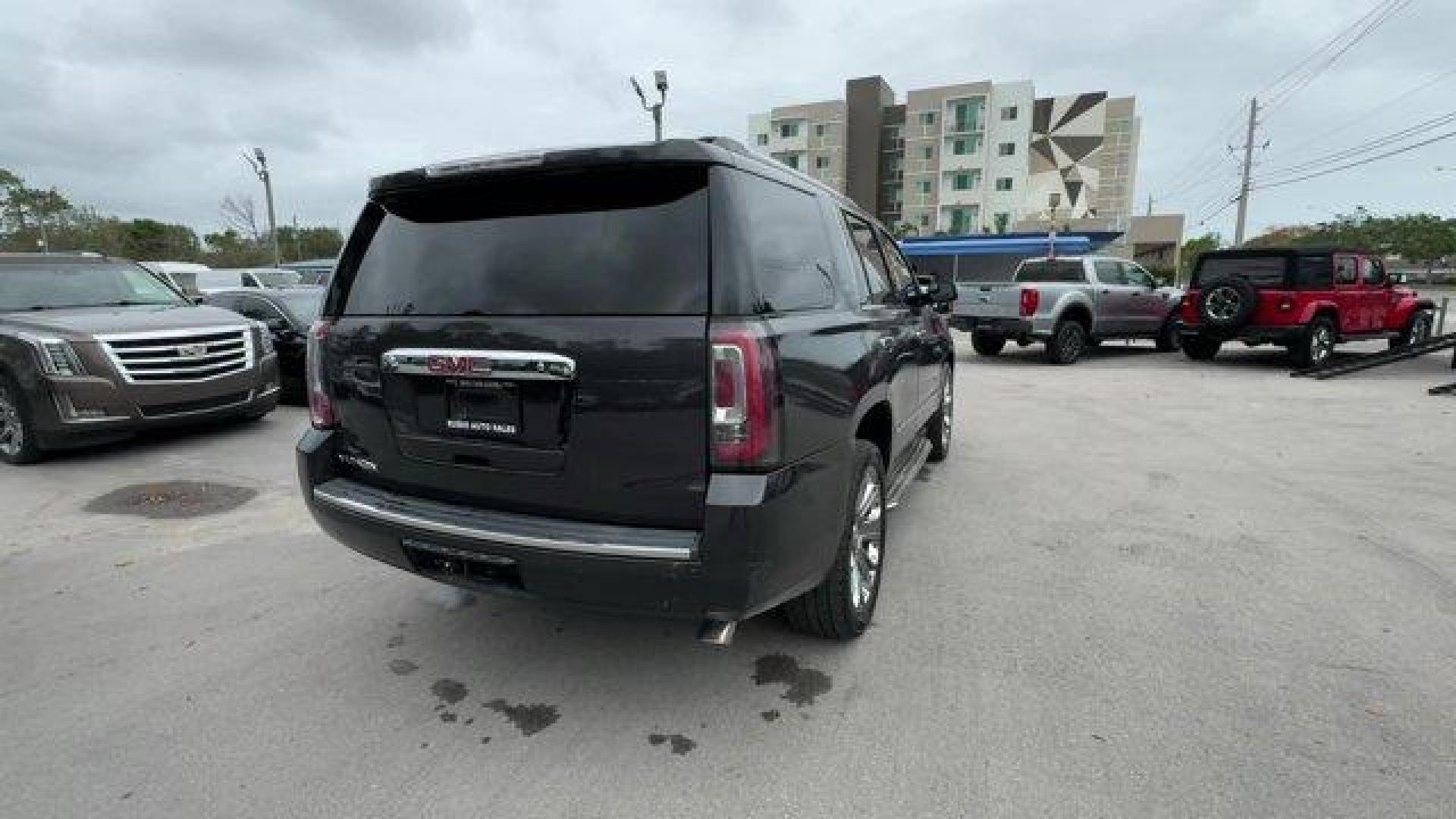 2015 Iridium Metallic /Cocoa/Shale GMC Yukon Denali (1GKS2CKJ0FR) with an 8 6.2L engine, Automatic transmission, located at 27610 S Dixie Hwy, Homestead, FL, 33032, (305) 749-2348, 25.510241, -80.438301 - KBB.com Brand Image Awards. Scores 21 Highway MPG and 15 City MPG! This GMC Yukon delivers a Gas V8 6.2L/378 engine powering this Automatic transmission. WHEELS, 22 X 8.5 (55.9 CM X 21.6 CM) ALUMINUM WITH CHROME INSERT, TRANSMISSION, 8-SPEED AUTOMATIC (STD), TIRES, P285/45R22, ALL SEASON, BLACKWALL - Photo#4