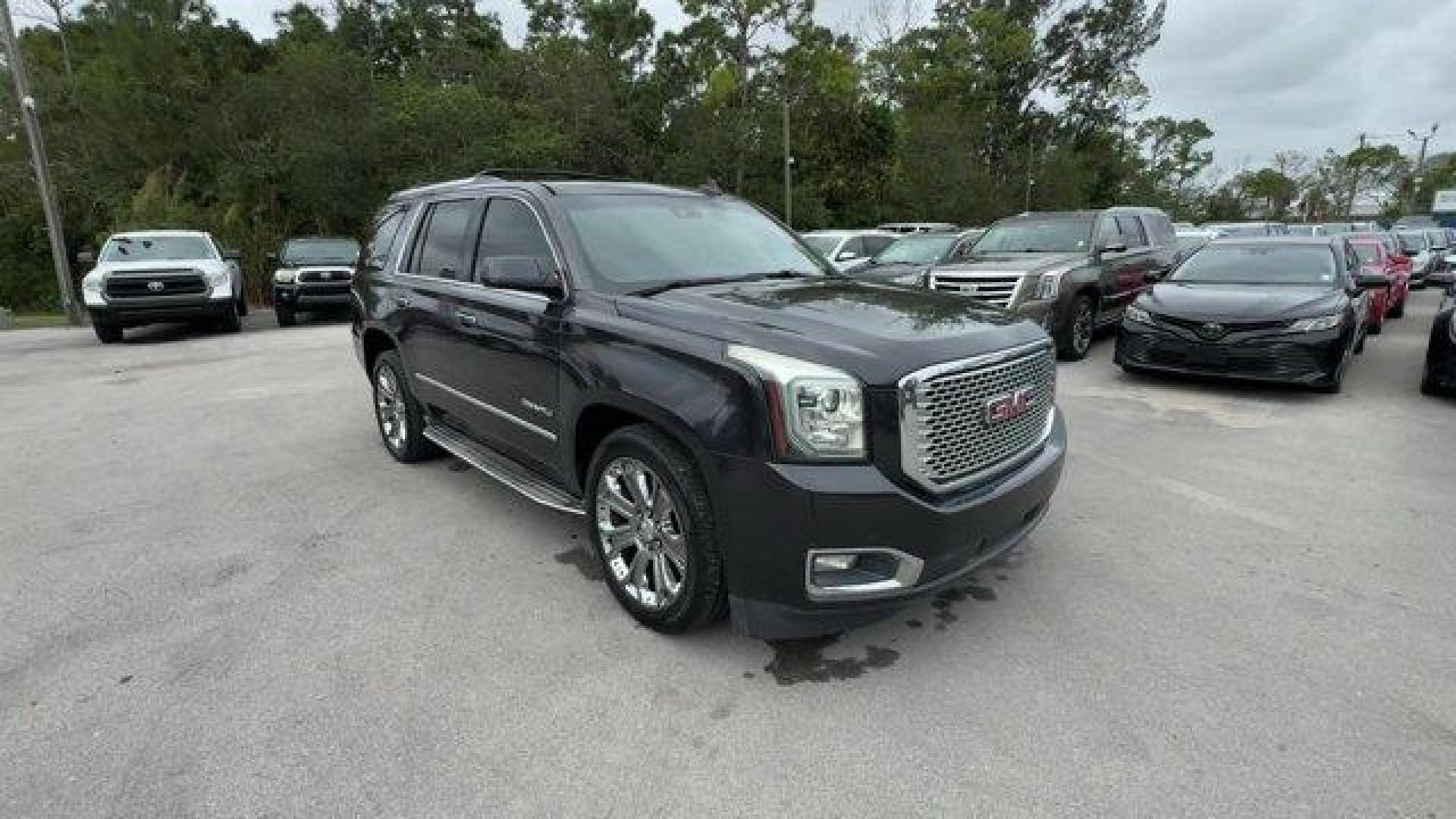 2015 Iridium Metallic /Cocoa/Shale GMC Yukon Denali (1GKS2CKJ0FR) with an 8 6.2L engine, Automatic transmission, located at 27610 S Dixie Hwy, Homestead, FL, 33032, (305) 749-2348, 25.510241, -80.438301 - KBB.com Brand Image Awards. Scores 21 Highway MPG and 15 City MPG! This GMC Yukon delivers a Gas V8 6.2L/378 engine powering this Automatic transmission. WHEELS, 22 X 8.5 (55.9 CM X 21.6 CM) ALUMINUM WITH CHROME INSERT, TRANSMISSION, 8-SPEED AUTOMATIC (STD), TIRES, P285/45R22, ALL SEASON, BLACKWALL - Photo#6