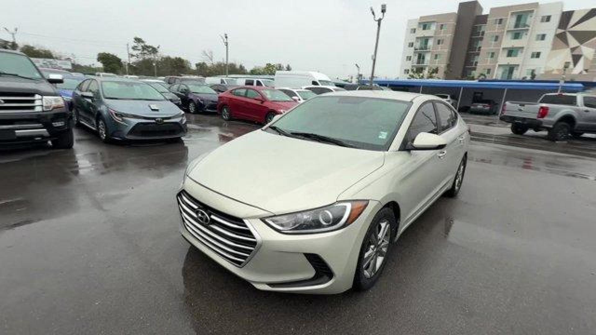 2017 Mineral Beige Pearl /Beige Hyundai Elantra SE (KMHD84LFXHU) with an 4 2.0 L engine, Automatic transmission, located at 27610 S Dixie Hwy, Homestead, FL, 33032, (305) 749-2348, 25.510241, -80.438301 - IIHS Top Safety Pick+, Top Safety Pick+. Delivers 38 Highway MPG and 29 City MPG! This Hyundai Elantra boasts a Regular Unleaded I-4 2.0 L/122 engine powering this Automatic transmission. SE A/T POPULAR EQUIPMENT PACKAGE 07 -inc: Option Group 07, Auto Headlamp Control, Rearview Camera w/Dynamic Guid - Photo#0