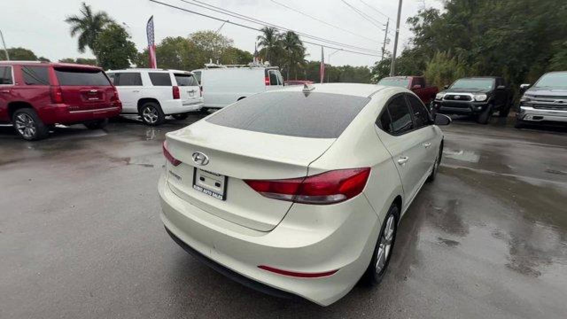 2017 Mineral Beige Pearl /Beige Hyundai Elantra SE (KMHD84LFXHU) with an 4 2.0 L engine, Automatic transmission, located at 27610 S Dixie Hwy, Homestead, FL, 33032, (305) 749-2348, 25.510241, -80.438301 - IIHS Top Safety Pick+, Top Safety Pick+. Delivers 38 Highway MPG and 29 City MPG! This Hyundai Elantra boasts a Regular Unleaded I-4 2.0 L/122 engine powering this Automatic transmission. SE A/T POPULAR EQUIPMENT PACKAGE 07 -inc: Option Group 07, Auto Headlamp Control, Rearview Camera w/Dynamic Guid - Photo#3
