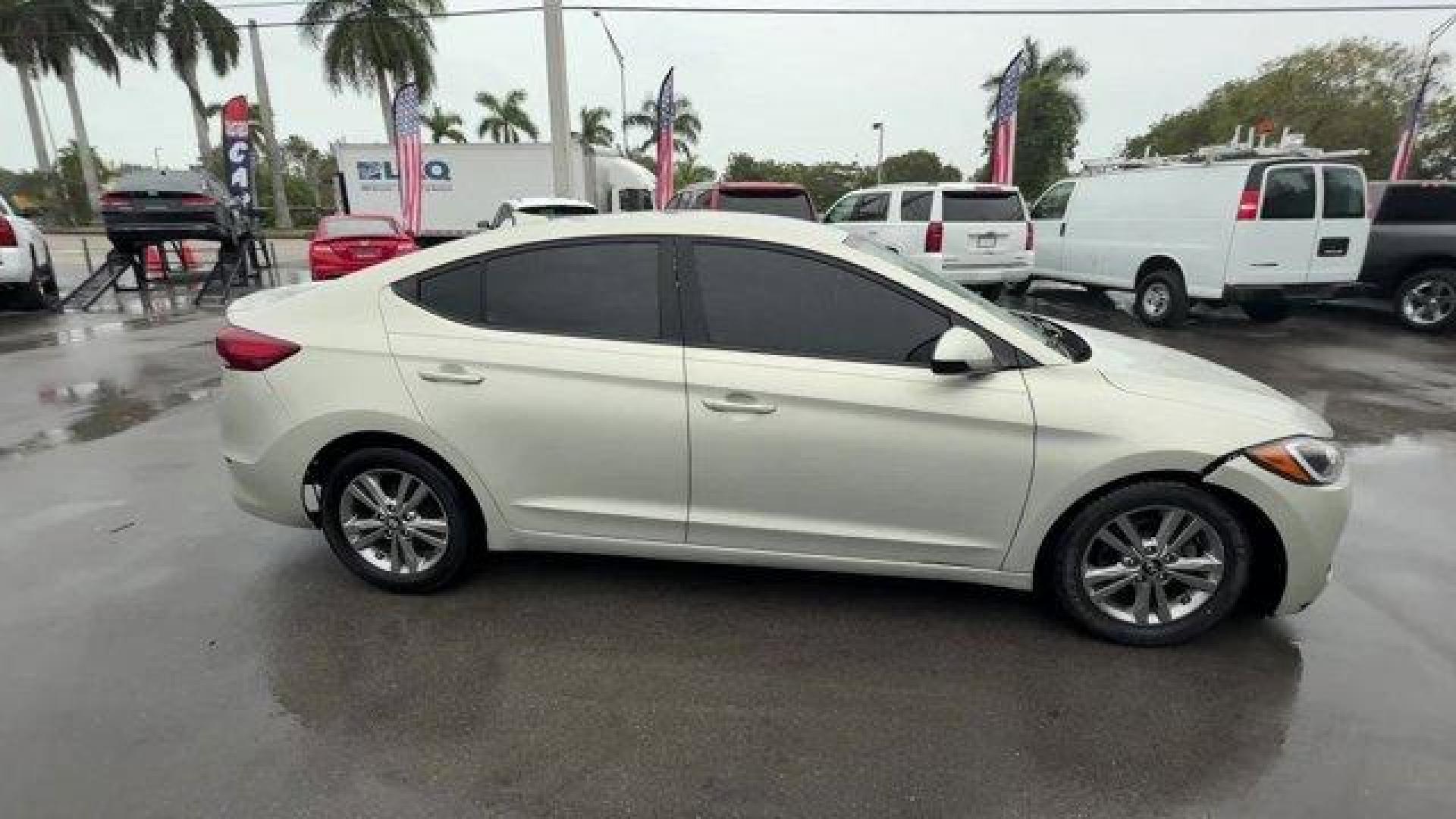 2017 Mineral Beige Pearl /Beige Hyundai Elantra SE (KMHD84LFXHU) with an 4 2.0 L engine, Automatic transmission, located at 27610 S Dixie Hwy, Homestead, FL, 33032, (305) 749-2348, 25.510241, -80.438301 - IIHS Top Safety Pick+, Top Safety Pick+. Delivers 38 Highway MPG and 29 City MPG! This Hyundai Elantra boasts a Regular Unleaded I-4 2.0 L/122 engine powering this Automatic transmission. SE A/T POPULAR EQUIPMENT PACKAGE 07 -inc: Option Group 07, Auto Headlamp Control, Rearview Camera w/Dynamic Guid - Photo#4