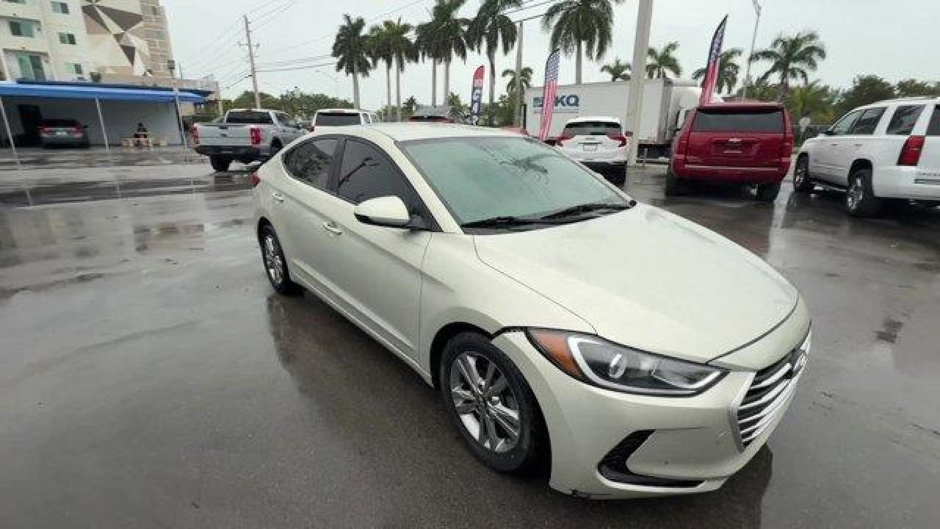 2017 Mineral Beige Pearl /Beige Hyundai Elantra SE (KMHD84LFXHU) with an 4 2.0 L engine, Automatic transmission, located at 27610 S Dixie Hwy, Homestead, FL, 33032, (305) 749-2348, 25.510241, -80.438301 - IIHS Top Safety Pick+, Top Safety Pick+. Delivers 38 Highway MPG and 29 City MPG! This Hyundai Elantra boasts a Regular Unleaded I-4 2.0 L/122 engine powering this Automatic transmission. SE A/T POPULAR EQUIPMENT PACKAGE 07 -inc: Option Group 07, Auto Headlamp Control, Rearview Camera w/Dynamic Guid - Photo#5