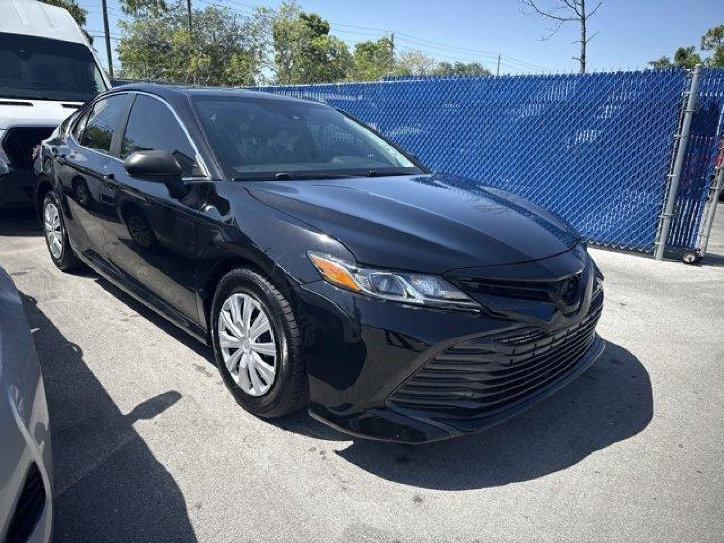 2018 Black Toyota Camry L (4T1B11HK7JU) with an 4 2.5 L engine, Automatic transmission, located at 27610 S Dixie Hwy, Homestead, FL, 33032, (305) 749-2348, 25.510241, -80.438301 - KBB.com 10 Most Awarded Cars. This Toyota Camry boasts a Regular Unleaded I-4 2.5 L/152 engine powering this Automatic transmission. Window Grid Antenna, Variable Intermittent Wipers, Valet Function.* This Toyota Camry Features the Following Options *Trunk Rear Cargo Access, Trip Computer, Toyota Sa - Photo#0