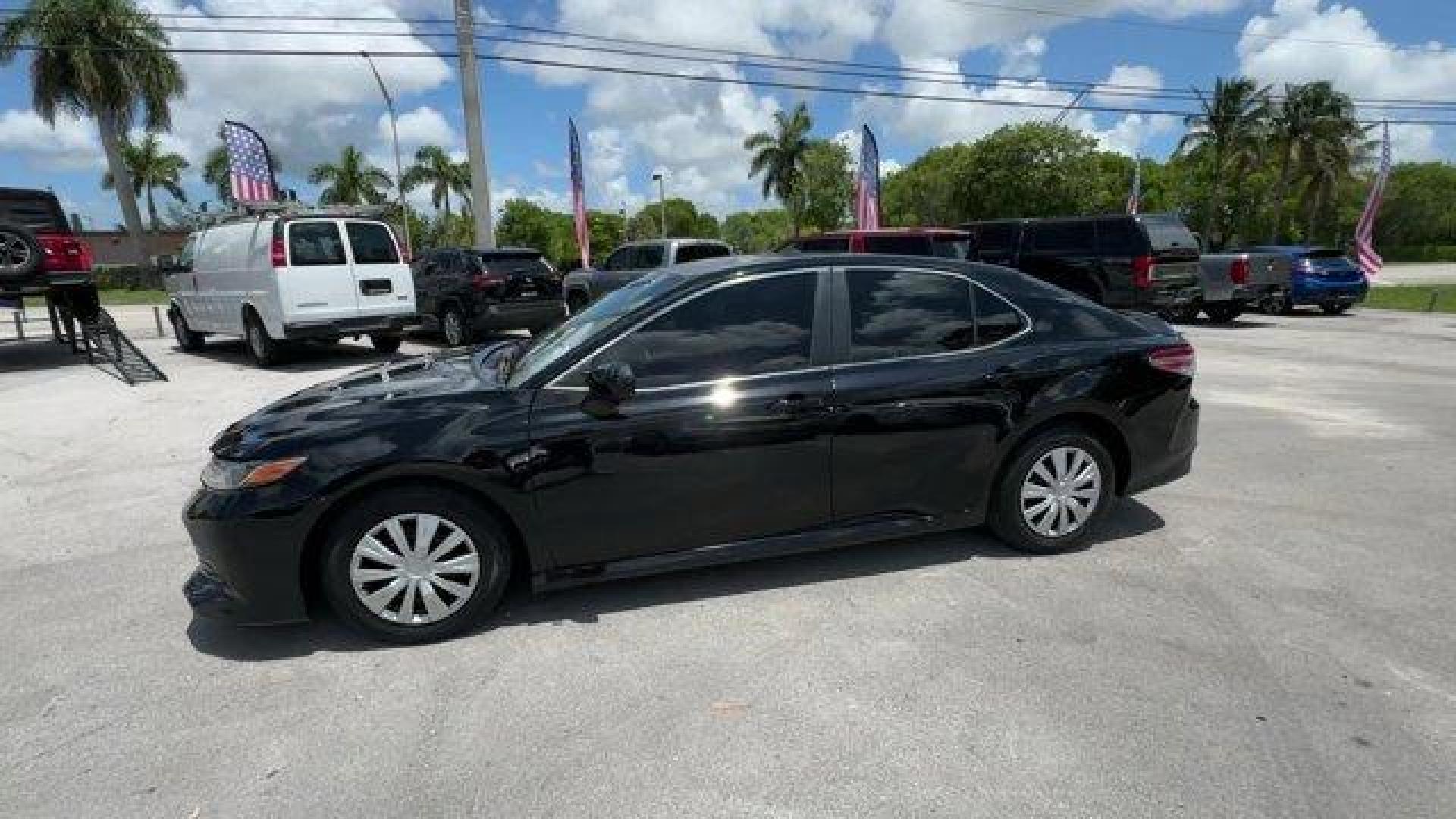 2018 Black Toyota Camry L (4T1B11HK7JU) with an 4 2.5 L engine, Automatic transmission, located at 27610 S Dixie Hwy, Homestead, FL, 33032, (305) 749-2348, 25.510241, -80.438301 - KBB.com 10 Most Awarded Cars. This Toyota Camry boasts a Regular Unleaded I-4 2.5 L/152 engine powering this Automatic transmission. Window Grid Antenna, Variable Intermittent Wipers, Valet Function.* This Toyota Camry Features the Following Options *Trunk Rear Cargo Access, Trip Computer, Toyota Sa - Photo#1