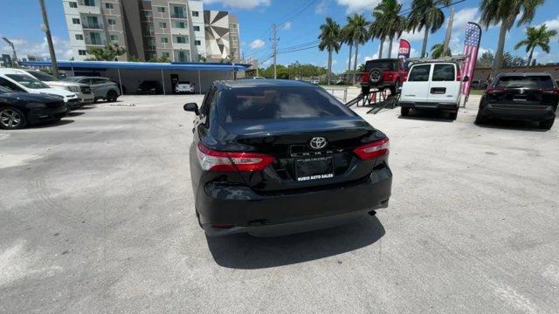 2018 Black Toyota Camry L (4T1B11HK7JU) with an 4 2.5 L engine, Automatic transmission, located at 27610 S Dixie Hwy, Homestead, FL, 33032, (305) 749-2348, 25.510241, -80.438301 - KBB.com 10 Most Awarded Cars. This Toyota Camry boasts a Regular Unleaded I-4 2.5 L/152 engine powering this Automatic transmission. Window Grid Antenna, Variable Intermittent Wipers, Valet Function.* This Toyota Camry Features the Following Options *Trunk Rear Cargo Access, Trip Computer, Toyota Sa - Photo#3