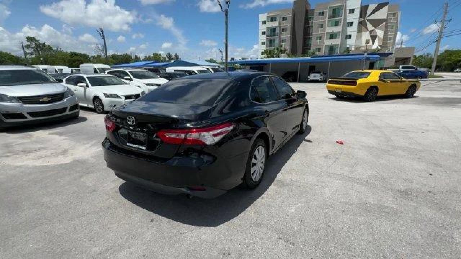 2018 Black Toyota Camry L (4T1B11HK7JU) with an 4 2.5 L engine, Automatic transmission, located at 27610 S Dixie Hwy, Homestead, FL, 33032, (305) 749-2348, 25.510241, -80.438301 - KBB.com 10 Most Awarded Cars. This Toyota Camry boasts a Regular Unleaded I-4 2.5 L/152 engine powering this Automatic transmission. Window Grid Antenna, Variable Intermittent Wipers, Valet Function.* This Toyota Camry Features the Following Options *Trunk Rear Cargo Access, Trip Computer, Toyota Sa - Photo#4