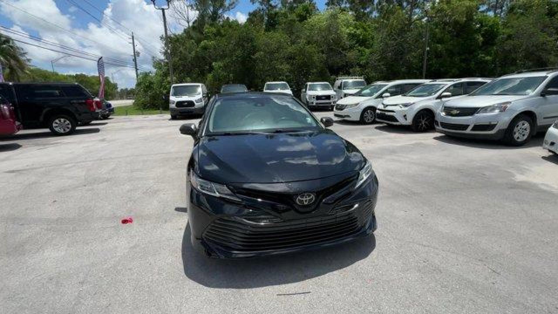 2018 Black Toyota Camry L (4T1B11HK7JU) with an 4 2.5 L engine, Automatic transmission, located at 27610 S Dixie Hwy, Homestead, FL, 33032, (305) 749-2348, 25.510241, -80.438301 - KBB.com 10 Most Awarded Cars. This Toyota Camry boasts a Regular Unleaded I-4 2.5 L/152 engine powering this Automatic transmission. Window Grid Antenna, Variable Intermittent Wipers, Valet Function.* This Toyota Camry Features the Following Options *Trunk Rear Cargo Access, Trip Computer, Toyota Sa - Photo#7