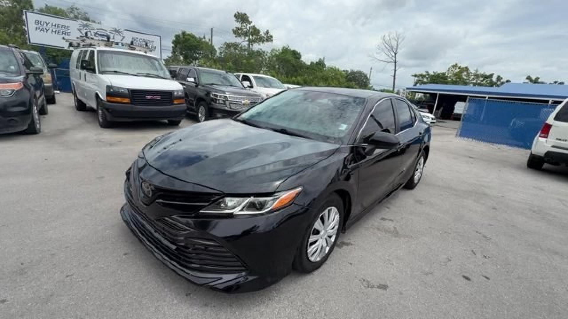 2018 Black Toyota Camry L (4T1B11HK7JU) with an 4 2.5 L engine, Automatic transmission, located at 27610 S Dixie Hwy, Homestead, FL, 33032, (305) 749-2348, 25.510241, -80.438301 - KBB.com 10 Most Awarded Cars. This Toyota Camry boasts a Regular Unleaded I-4 2.5 L/152 engine powering this Automatic transmission. Window Grid Antenna, Variable Intermittent Wipers, Valet Function.* This Toyota Camry Features the Following Options *Trunk Rear Cargo Access, Trip Computer, Toyota Sa- Photo#0