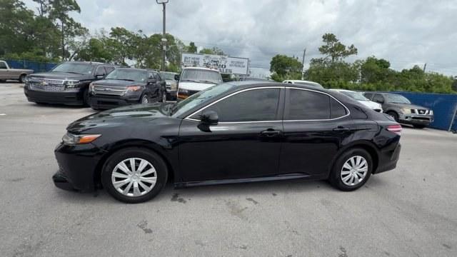 2018 Black Toyota Camry L (4T1B11HK7JU) with an 4 2.5 L engine, Automatic transmission, located at 27610 S Dixie Hwy, Homestead, FL, 33032, (305) 749-2348, 25.510241, -80.438301 - KBB.com 10 Most Awarded Cars. This Toyota Camry boasts a Regular Unleaded I-4 2.5 L/152 engine powering this Automatic transmission. Window Grid Antenna, Variable Intermittent Wipers, Valet Function.* This Toyota Camry Features the Following Options *Trunk Rear Cargo Access, Trip Computer, Toyota Sa- Photo#1